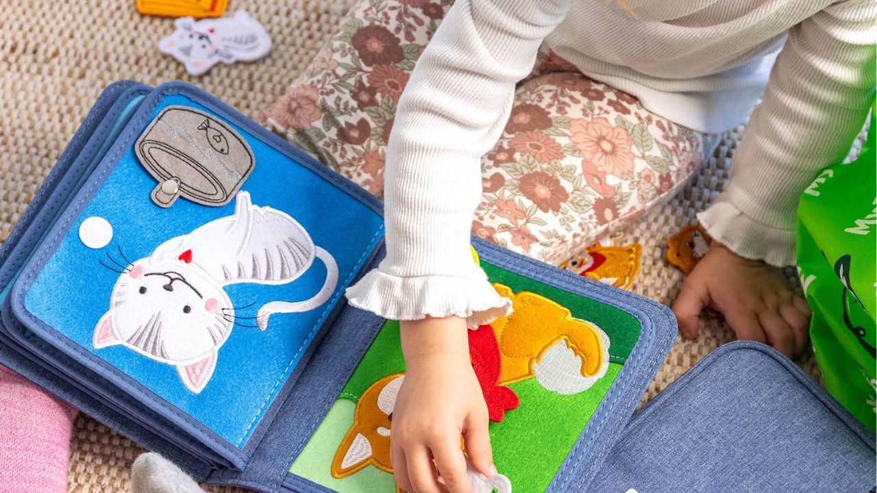 How to Incorporate Sensory Play into Your Child’s Routine with a Fabric Busy Book?